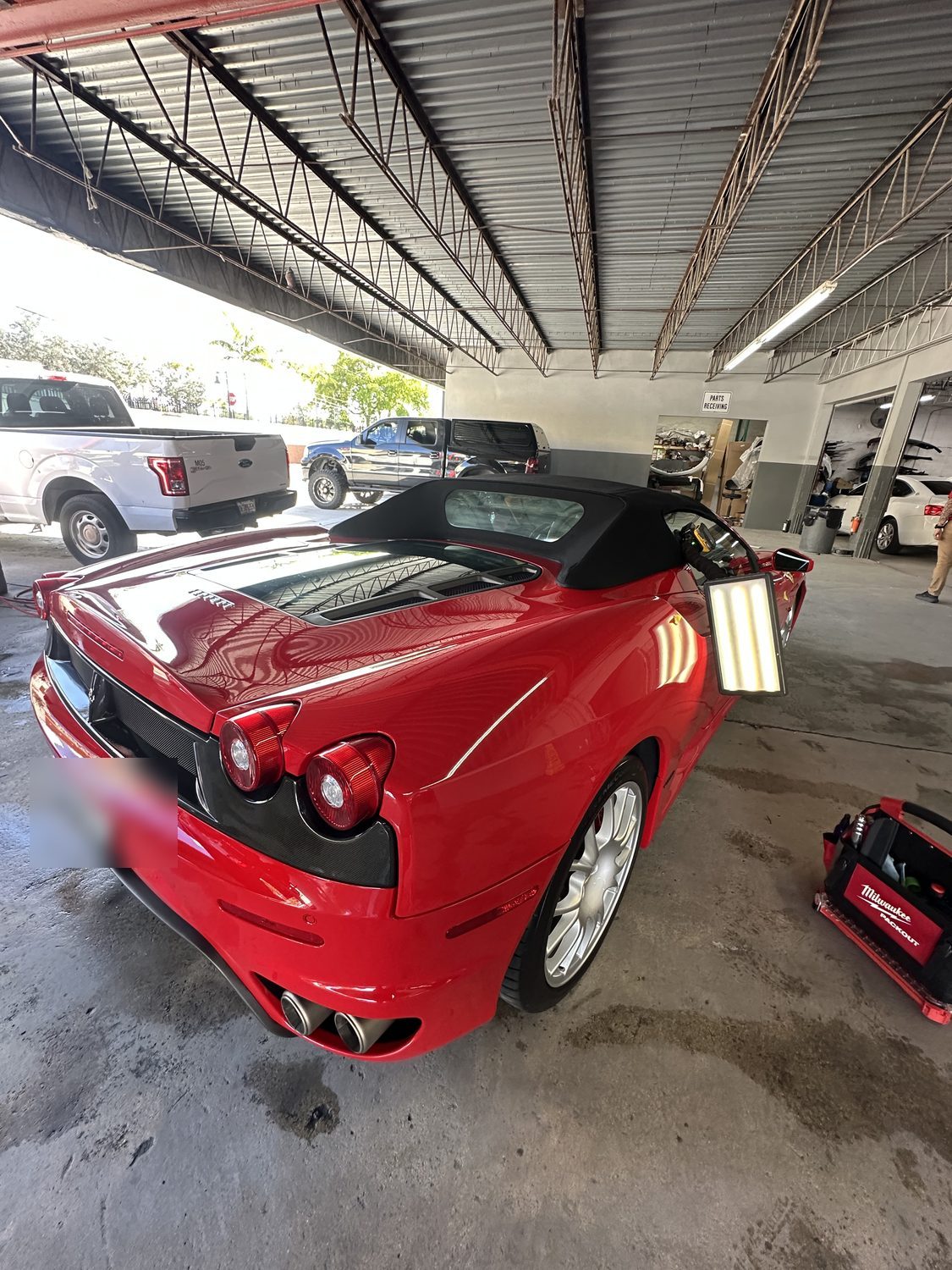 Ferrari F430 paintless dent repair in the shop, Caliber PDR Miami