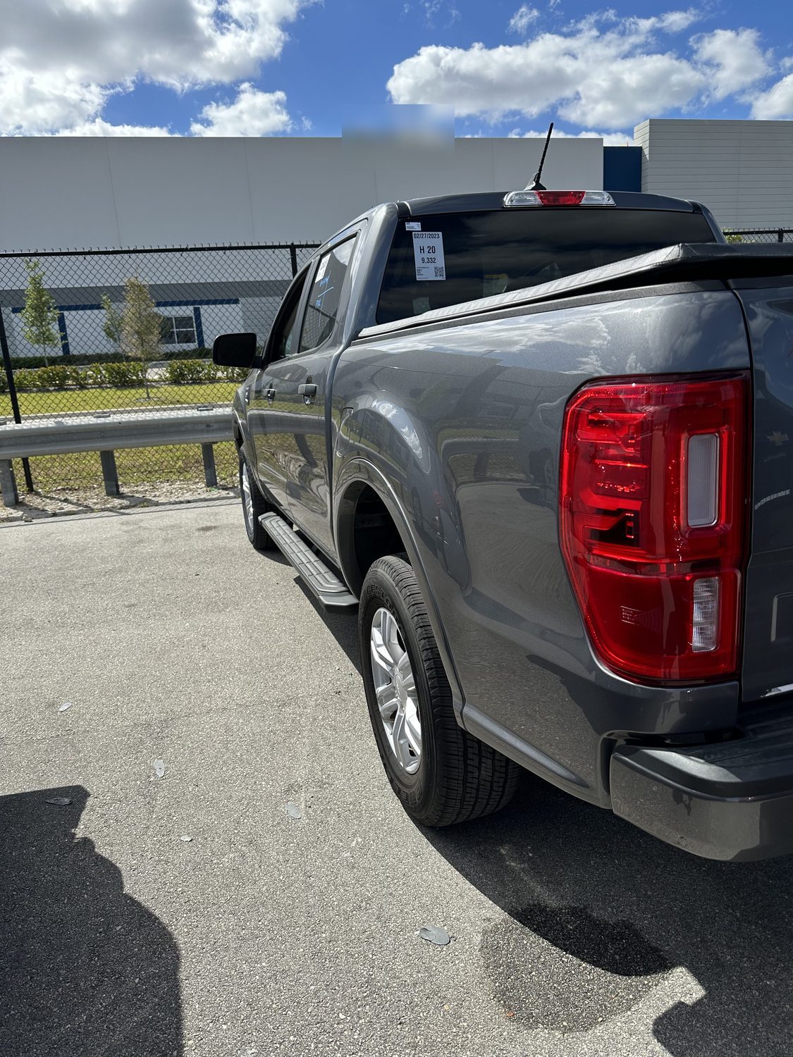 Gray Ford Ranger pickup truck after paintless dent repair, Miami