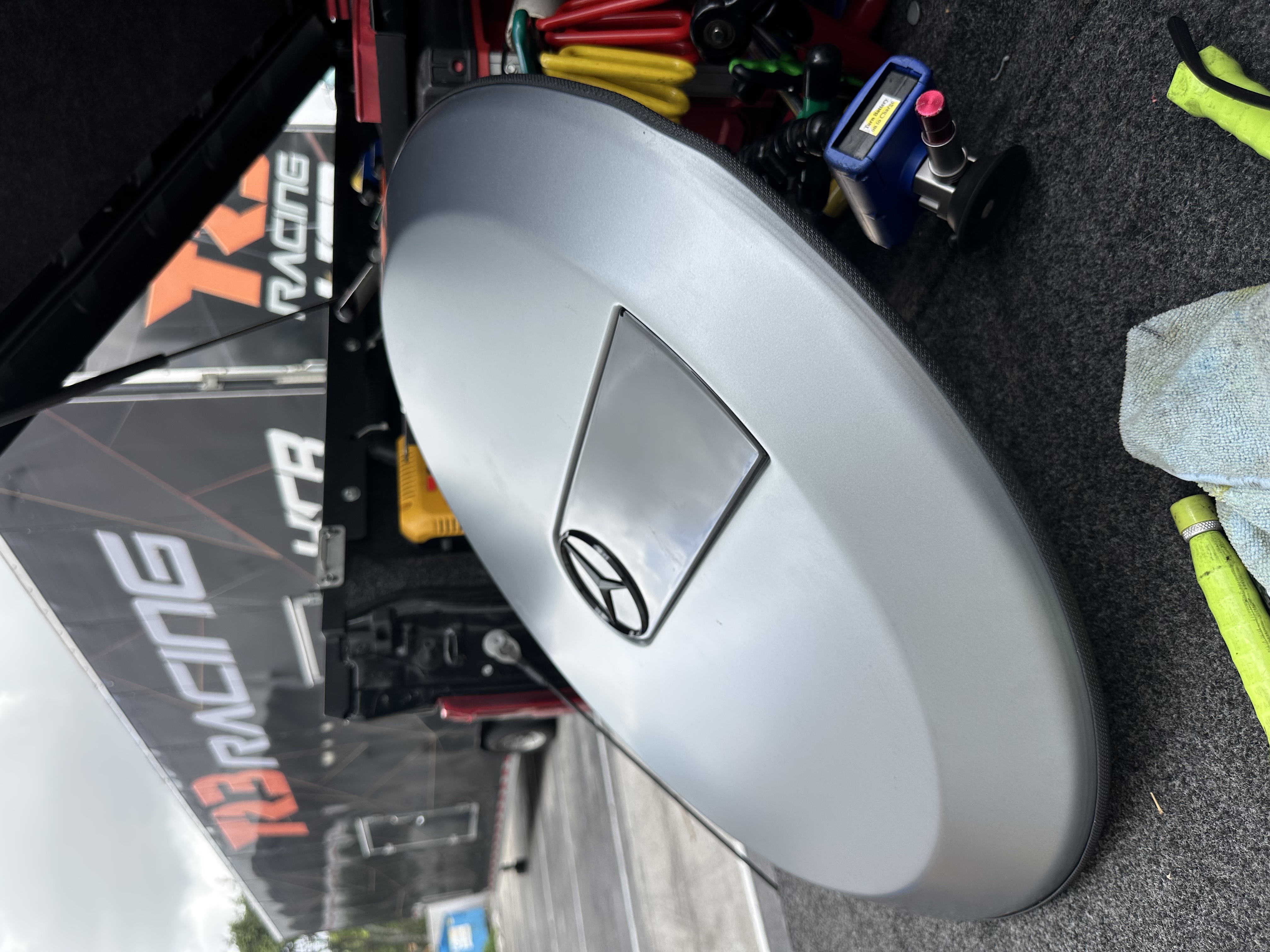 Silver Mercedes trunk lid after paintless dent repair — restored to factory, Miami